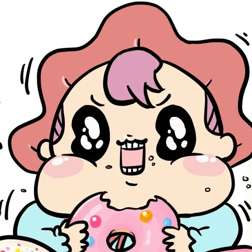 ドーナツをほおばるモギュたん